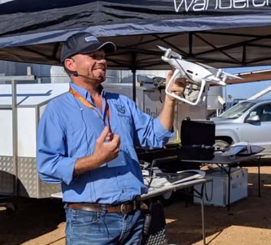 Man holding a small drone